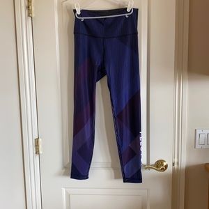 Peloton With Purple stripes size L leggings